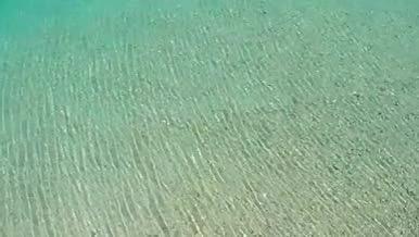 夏季赛里木湖航拍湖面视频的预览图